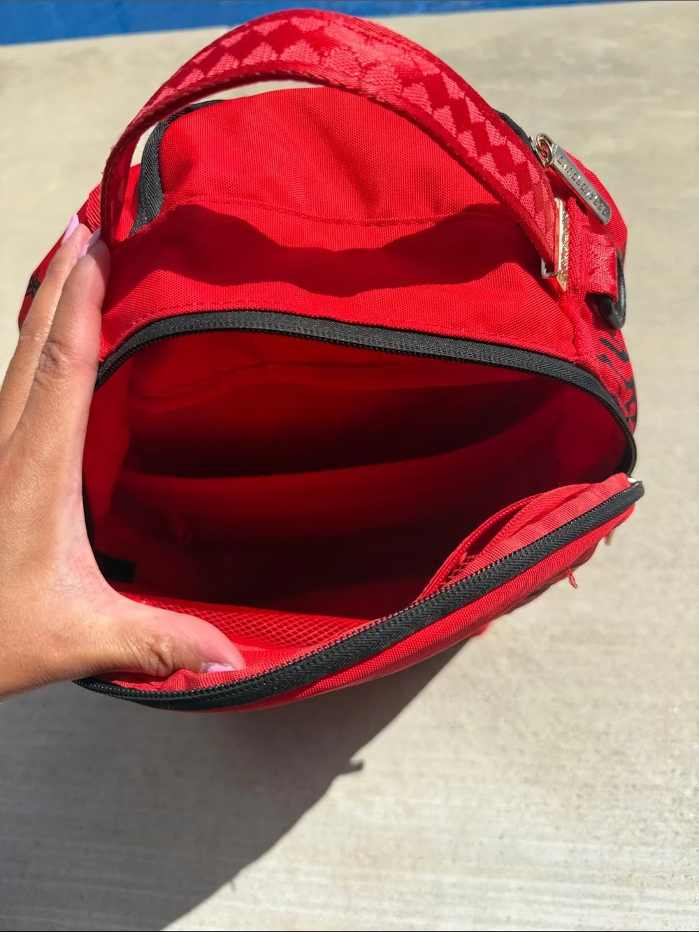 Sprayground Red Graphic Backpack - Gummy Monster Design